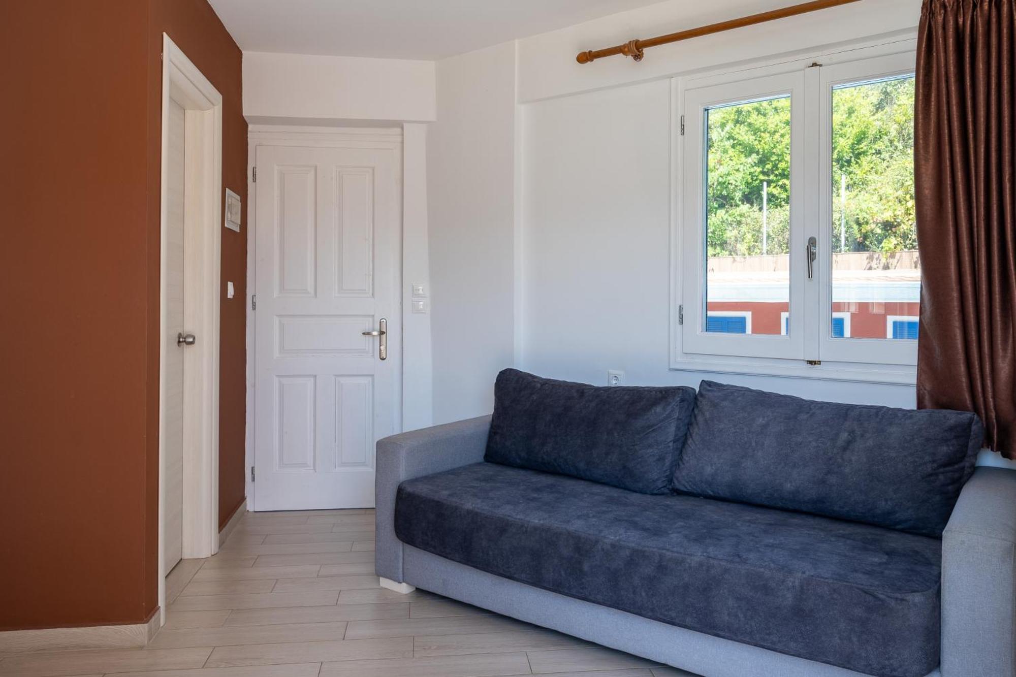 Vliho Bay Boutique Hotel Yénion Quarto foto